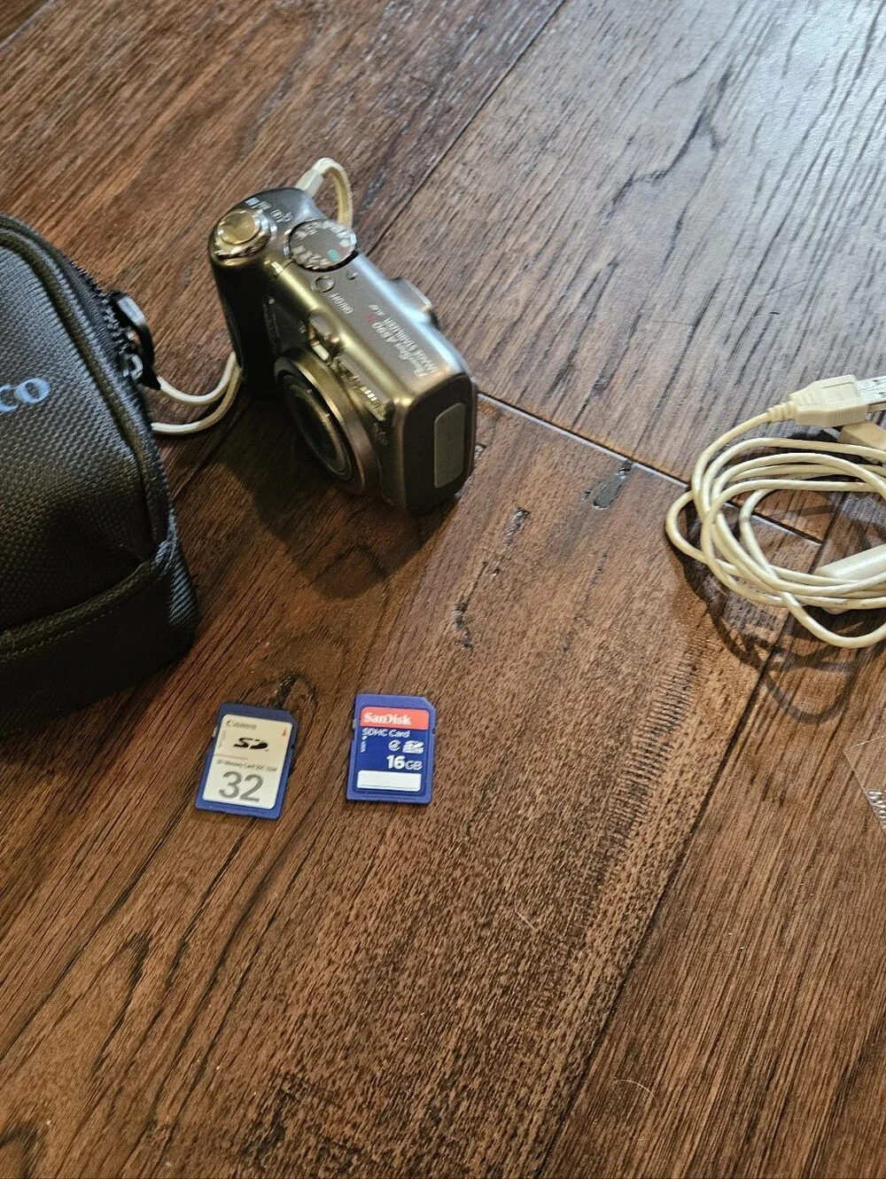 Canon PowerShot A590 IS 8.0mp Compact Point Shoot Digital Camera W/ SD Card, Bag